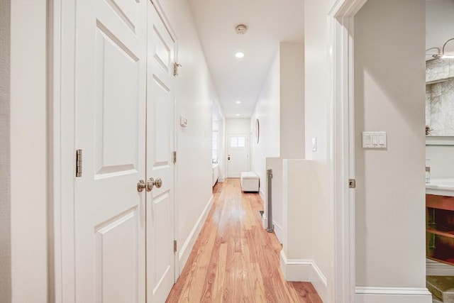 19 Harris St Unit 2, Brookline, MA 02446 - hallway featuring light wood-style floors, recessed lighting, and baseboards