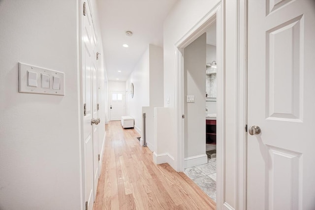 19 Harris St Unit 2, Brookline, MA 02446 - hallway with light wood-style floors, recessed lighting, and baseboards