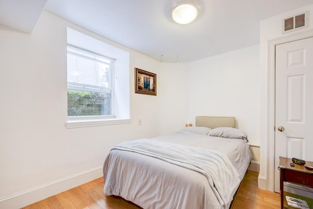 19 Harris St Unit 2, Brookline, MA 02446 - bedroom featuring light wood-style floors and baseboards