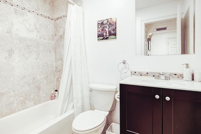 19 Harris St Unit 2, Brookline, MA 02446 - bathroom with toilet, vanity, tasteful backsplash, and shower / bathtub combination with curtain