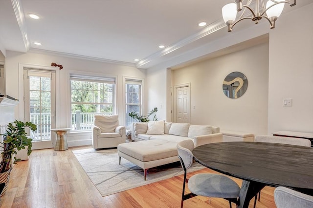 19 Harris St Unit 2, Brookline, MA 02446 - living area with a chandelier, light wood-style flooring, crown molding, and recessed lighting