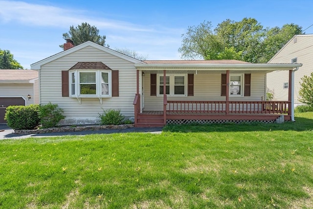 76 N Main St, Bellingham, MA 02019 - ranch-style home featuring a porch, a front lawn, a garage, and a chimney