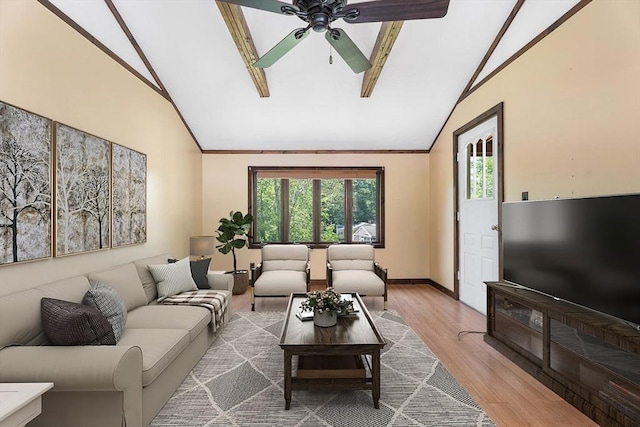 76 N Main St, Bellingham, MA 02019 - living room with baseboards, ceiling fan, wood finished floors, high vaulted ceiling, and beamed ceiling