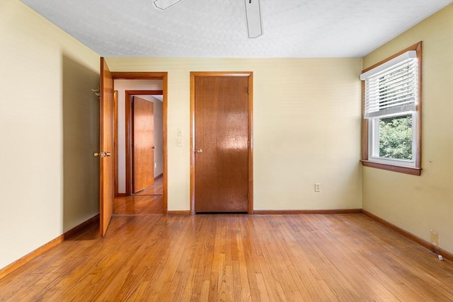 76 N Main St, Bellingham, MA 02019 - spare room featuring light wood finished floors and baseboards