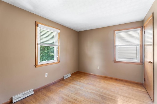 76 N Main St, Bellingham, MA 02019 - unfurnished room featuring light wood-style floors and baseboards
