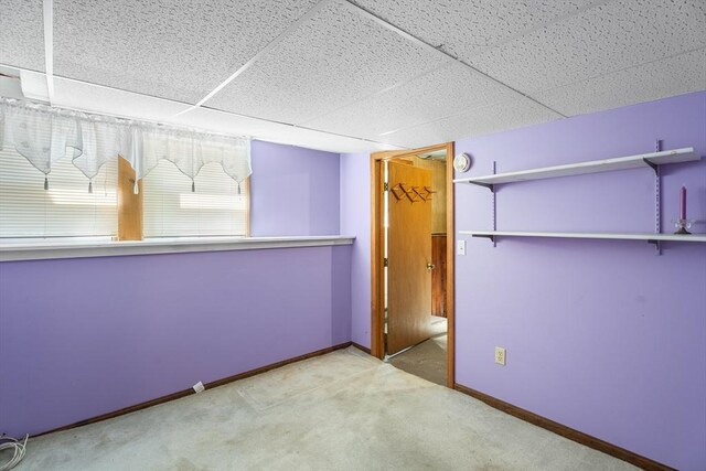 76 N Main St, Bellingham, MA 02019 - unfurnished bedroom featuring carpet, a paneled ceiling, baseboards, and a closet