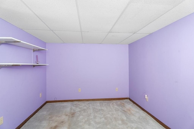 76 N Main St, Bellingham, MA 02019 - empty room featuring carpet flooring, baseboards, and a drop ceiling