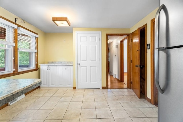76 N Main St, Bellingham, MA 02019 - interior space featuring light tile patterned flooring and baseboards