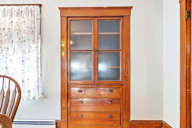 room details featuring a baseboard heating unit