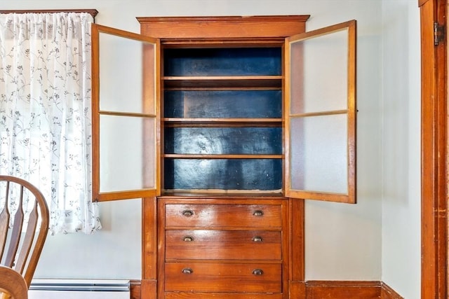 closet with a baseboard radiator