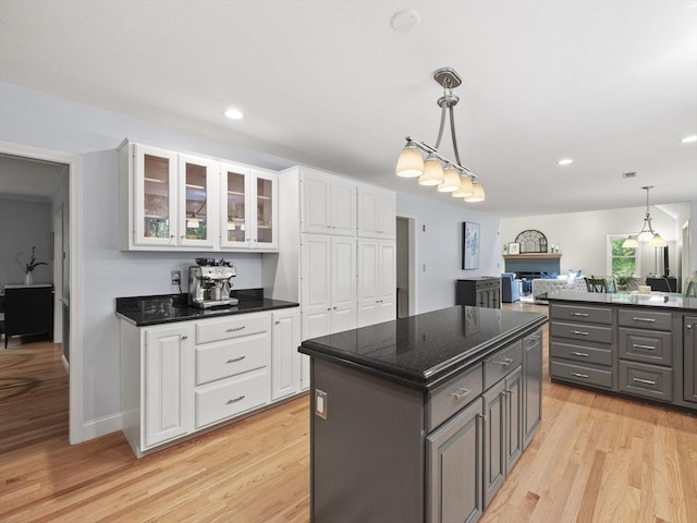 200 Newtown Rd, Acton, MA 01720 - kitchen featuring gray cabinets, white cabinets, light wood finished floors, glass insert cabinets, and recessed lighting