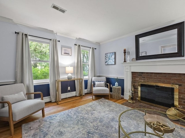 200 Newtown Rd, Acton, MA 01720 - living room with crown molding, wood finished floors, and a fireplace