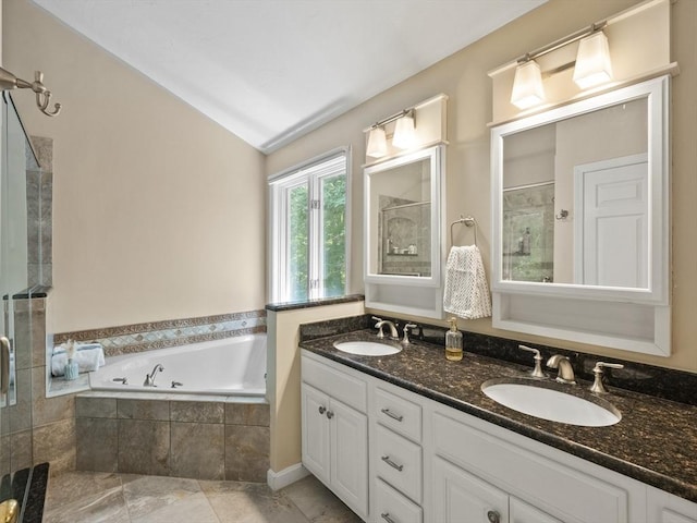 200 Newtown Rd, Acton, MA 01720 - bathroom with a garden tub, double vanity, a tile shower, and lofted ceiling