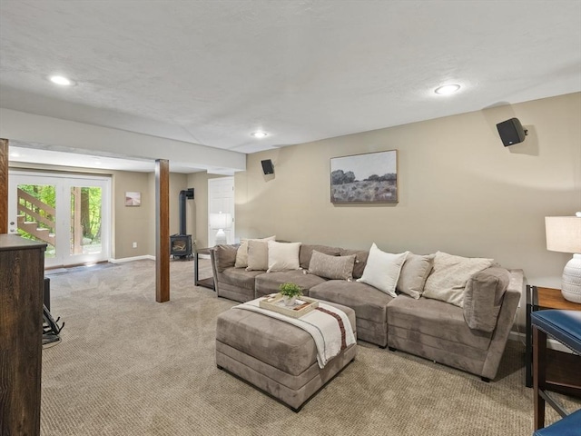 200 Newtown Rd, Acton, MA 01720 - living area with a wood stove, light colored carpet, and recessed lighting