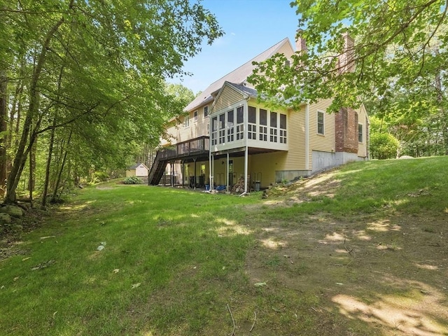 200 Newtown Rd, Acton, MA 01720 - back of house with stairway, a sunroom, a deck, a chimney, and a yard