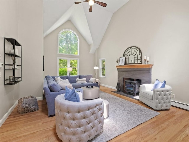 200 Newtown Rd, Acton, MA 01720 - living room with a ceiling fan, wood finished floors, high vaulted ceiling, and baseboard heating