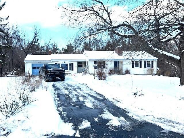 view of snow covered house