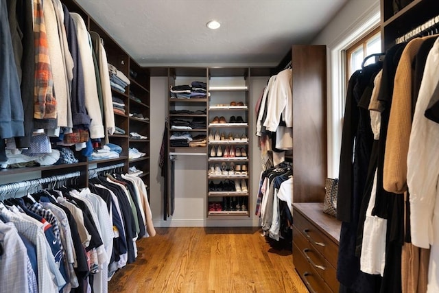 spacious closet featuring wood finished floors