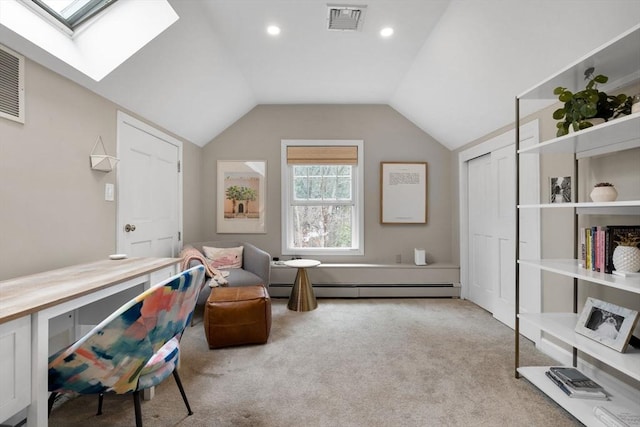 sitting room featuring carpet floors, visible vents, baseboard heating, and vaulted ceiling with skylight