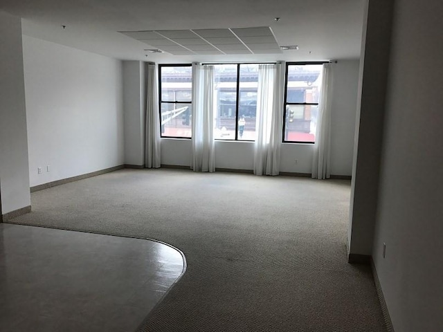 531 Main St Unit 203, Worcester, MA 01608 - spare room featuring light carpet, healthy amount of natural light, and baseboards
