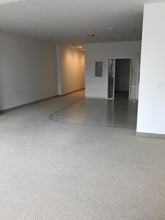 531 Main St Unit 203, Worcester, MA 01608 - empty room featuring baseboards and electric panel