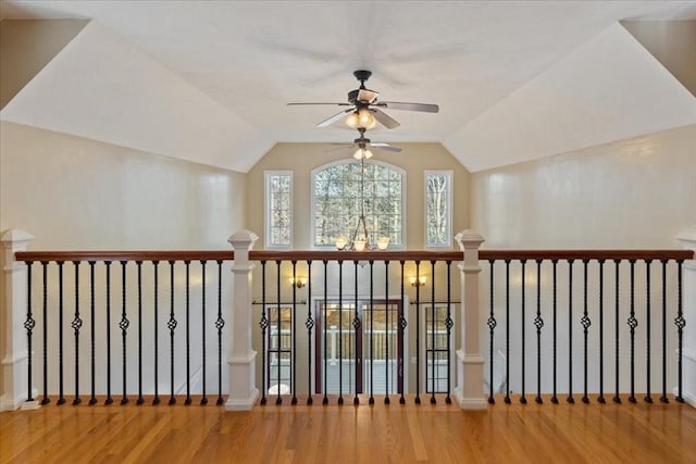 interior space with wood-type flooring and lofted ceiling