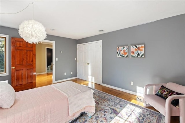 bedroom with wood-type flooring