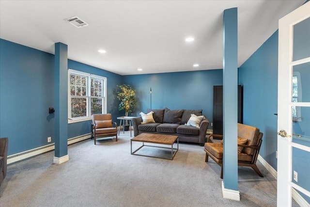 living room featuring carpet flooring and a baseboard radiator