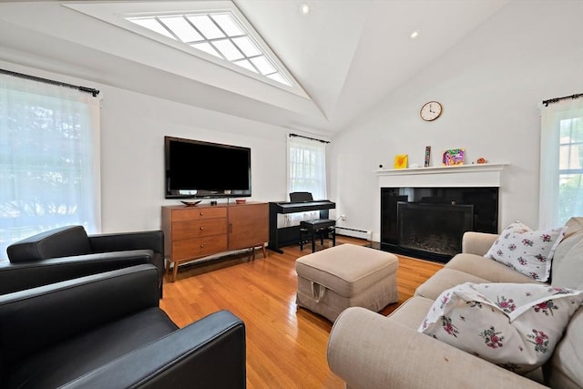 141 Cornell St, Newton, MA 02462 - living room with plenty of natural light, light wood-type flooring, a fireplace with flush hearth, high vaulted ceiling, and a baseboard radiator