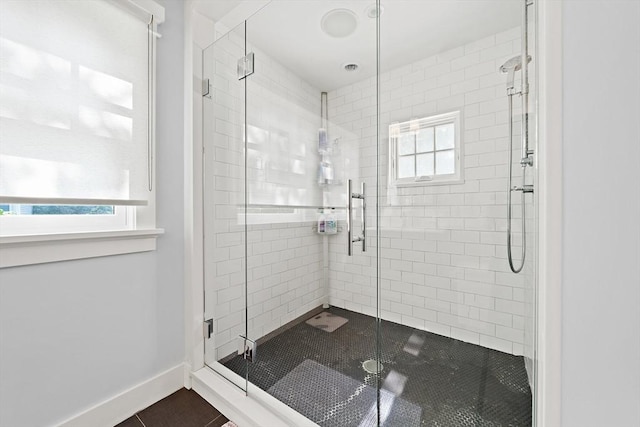 141 Cornell St, Newton, MA 02462 - full bathroom featuring healthy amount of natural light, a stall shower, and tile patterned flooring