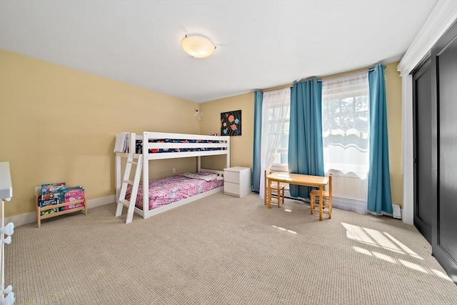 141 Cornell St, Newton, MA 02462 - carpeted bedroom featuring baseboards