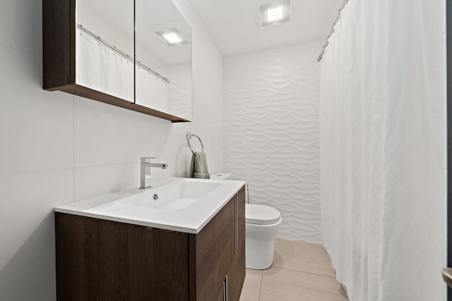 141 Cornell St, Newton, MA 02462 - full bath featuring vanity, tile patterned floors, and a shower with curtain