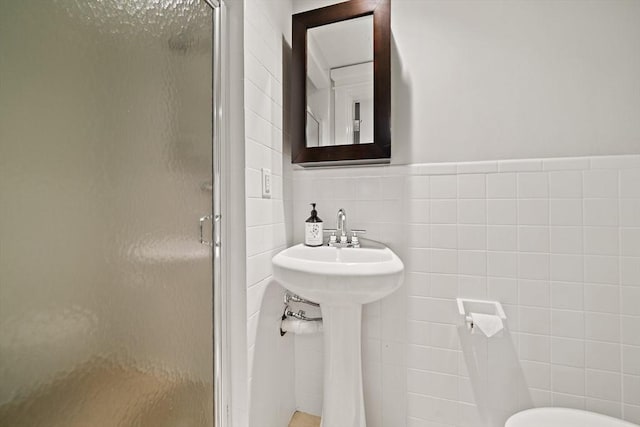141 Cornell St, Newton, MA 02462 - bathroom with a shower stall and tile walls