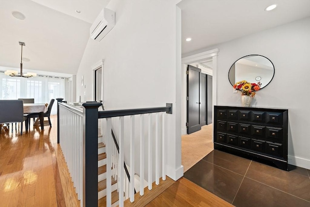 141 Cornell St, Newton, MA 02462 - stairs with an AC wall unit, a chandelier, recessed lighting, and wood finished floors