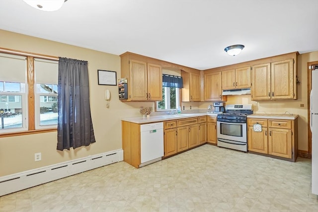 kitchen featuring sink, white appliances, and baseboard heating