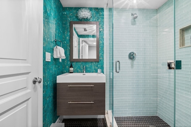 bathroom featuring vanity, tile patterned floors, and an enclosed shower