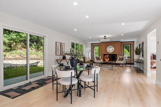 122 Charles St, Reading, MA 01867 - dining room with light wood finished floors, recessed lighting, and baseboards
