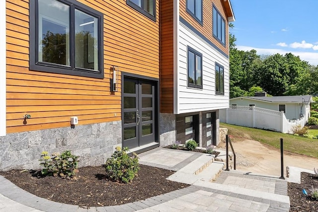 122 Charles St, Reading, MA 01867 - entrance to property featuring french doors