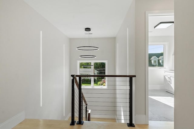 122 Charles St, Reading, MA 01867 - corridor featuring an upstairs landing and baseboards