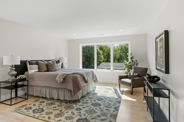 122 Charles St, Reading, MA 01867 - bedroom with light wood-type flooring and recessed lighting