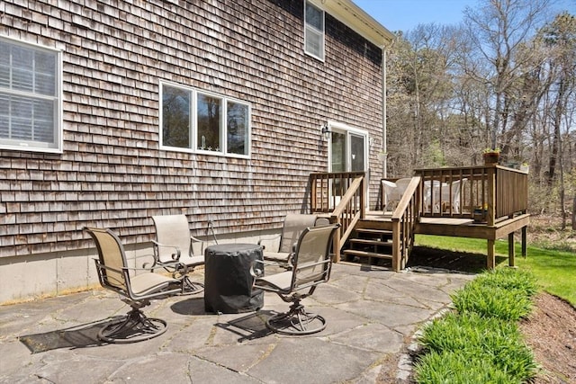 view of patio with a wooden deck