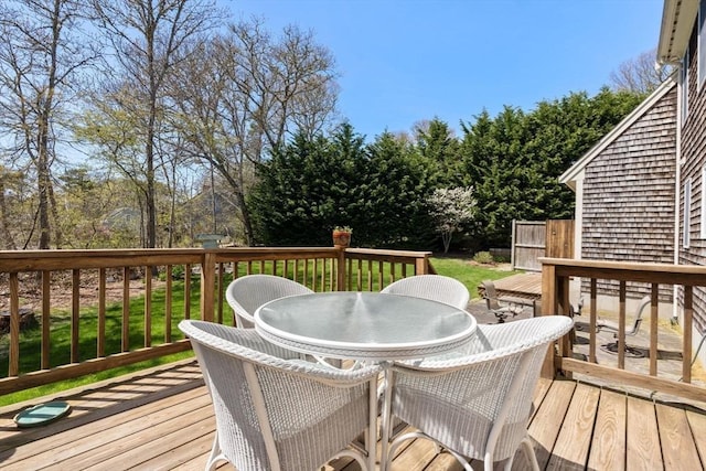 deck with outdoor dining space