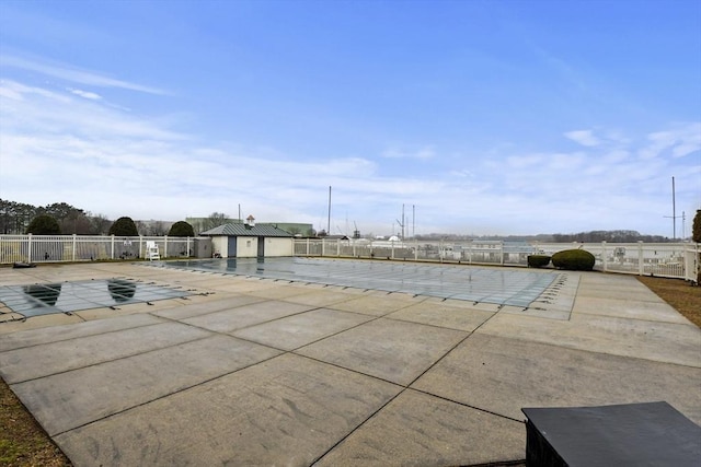 view of pool featuring a patio