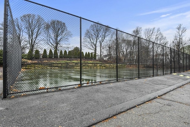 exterior space with tennis court