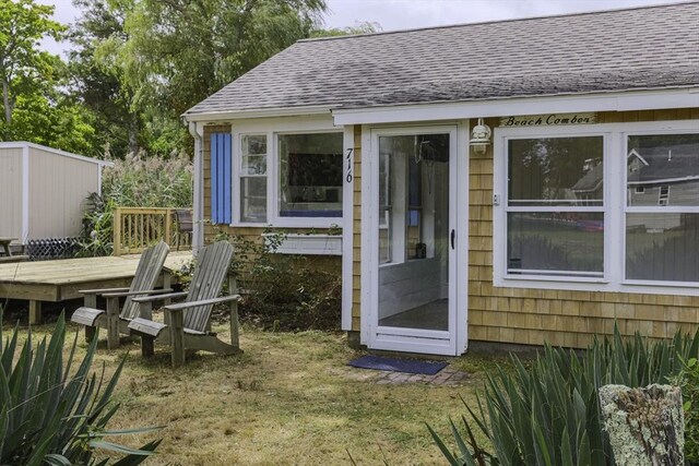 view of yard featuring a wooden deck