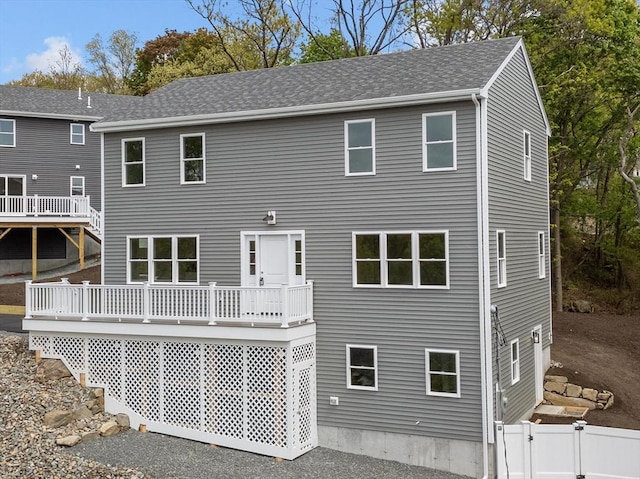 17 Upland Rd, Lynn, MA 01902 - rear view of property with a deck, a gate, and a shingled roof