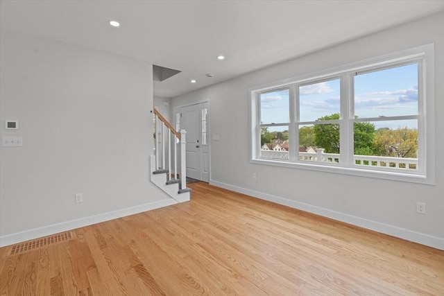 17 Upland Rd, Lynn, MA 01902 - unfurnished living room featuring stairway, light wood finished floors, and recessed lighting