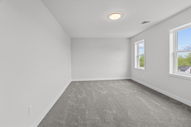 17 Upland Rd, Lynn, MA 01902 - carpeted spare room featuring baseboards