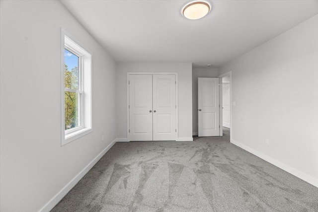 17 Upland Rd, Lynn, MA 01902 - unfurnished bedroom featuring carpet floors and a closet