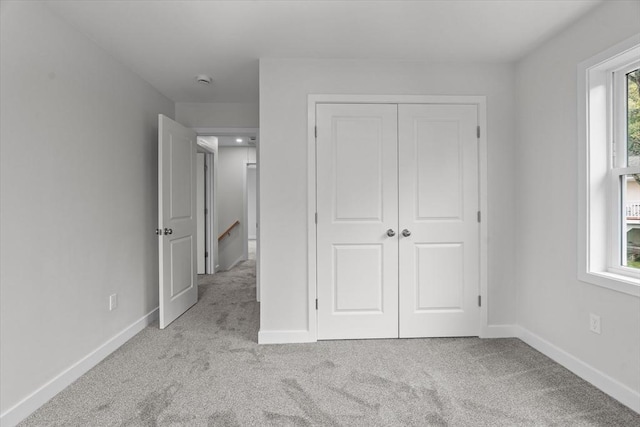 17 Upland Rd, Lynn, MA 01902 - unfurnished bedroom with carpet floors and a closet